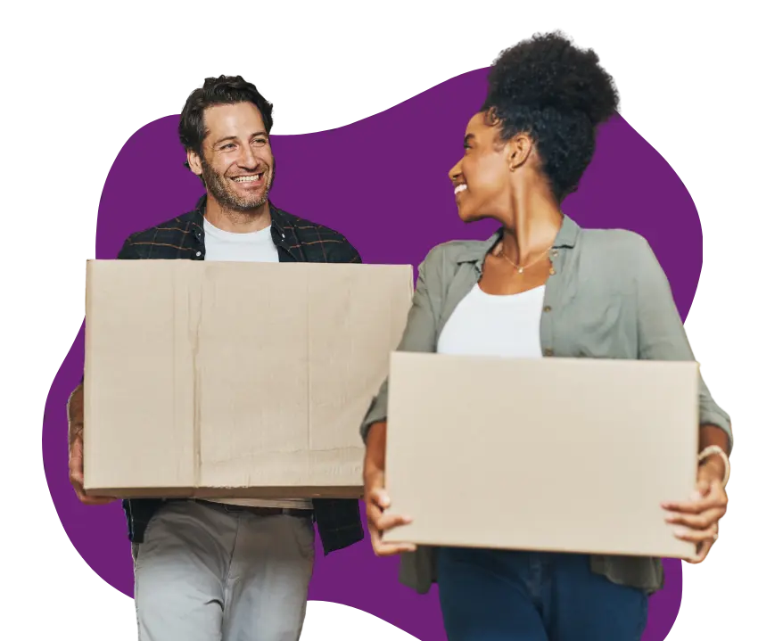 Young couple with moving boxes.